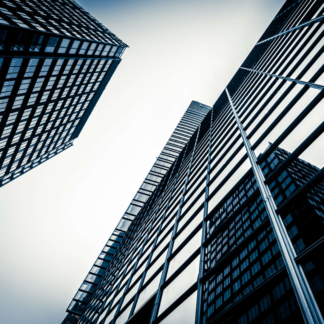modern blue glass wall of skyscraper