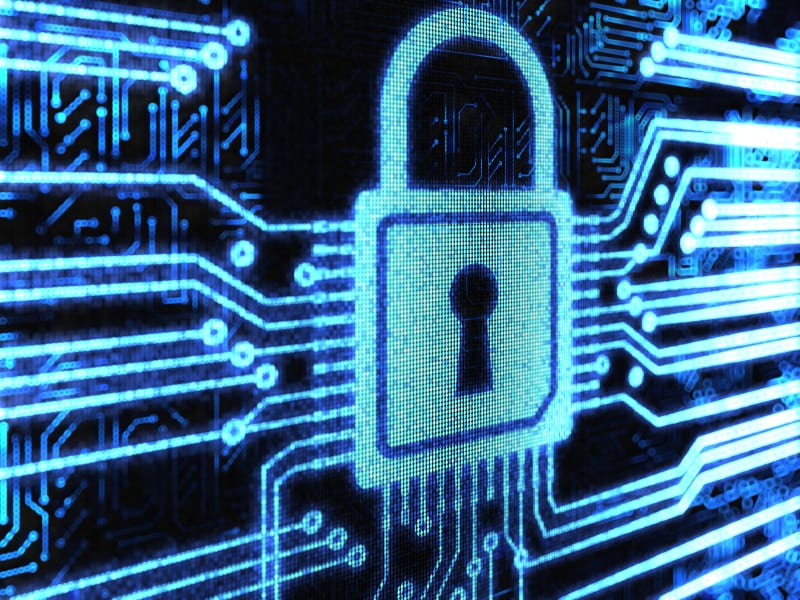 image depicting a padlock on a computer chip to signify security